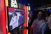 Avid gamers try out EA Sports Madden NFL 15 at the NFL Super Bash