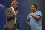 Man City manager Manuel Pellegrini and Jason Manford at City Live