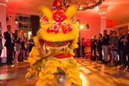 A cheeky lion performed at the RSA House's 'year of the horse' event