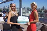 Bimla Safka (right) celebrates Smart Live's first birthday with team and suppliers