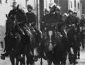 Mounted riot police head for Wapping