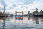 Extinction Rebellion sends 'sinking house' down Thames