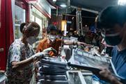Hong Kong pro-democracy newspaper Apple Daily prints million copies of final edition