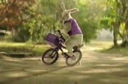 The new campaign features the mysterious purple-clad Easter Bunny