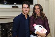 Kevin Jonas: pictured with his wife Danielle who is cradling a bottle of Dreft