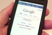 Google's revenues surge but shares drop as it grapples with transition to mobile