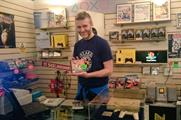 The pop-up's 1990s interior (@InsertCoinTees)