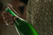 Glitzy revellers quaff lager to celebrate Stella Artois' Christmas birthday