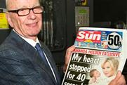 Rupert Murdoch with the launch edition of The Sun on Sunday