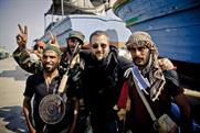 Vice Media: founder and chief executive Shane Smith, centre, in Libya (photo: Tim Freccia)