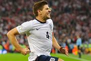 ITV: England footballer Steven Gerrard celebrates after scoring the second goal against Poland