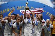 Megan Rapinoe lifts the Women's World Cup trophy after defeating Netherlands in the final on Sunday (Photo: Getty)