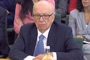Rupert Murdoch: apologises in newspapers for hacking
