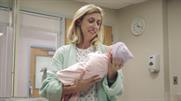 Woman contemplates stealing baby in Lifetime Movie Network spot