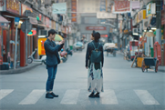 You, me and iPhone makes three on the bustling streets of Shanghai