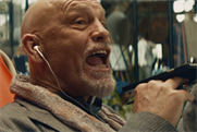 John Malkovich plays hardball with himself in Squarespace Super Bowl spot