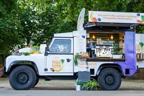 A Land Rover carrying Sainsbury's branding and the words 'Great fruit & veg challenge'