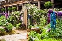 The garden featured flowers, a fountain and tree made out of clothes