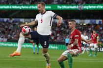 England's Harry Kane in action holds off Hungary's Zsolt Nagy in UEFA Nations League game this year. Photo: Getty Images
