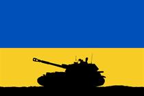 An image of the Ukraine flag with a black silhouette of a tank