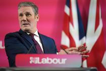 Labour leader Keir Starmer stands at a lectern delivering a speech outlining his party's vision for 2022