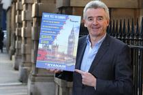 Ryanair chief executive Michael O'Leary with a mock-up of tomorrow's newspaper ad