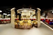 The 557sqm aviation-themed space is built around a bespoke bar replicating an aircraft engine
