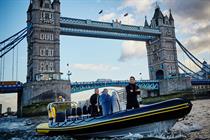 McBride was sailed in a speedboat down the Thames with Milk Tray in hand