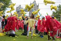 Katie Price joined in the piñata smash yesterday (20 May)