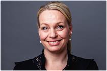 Headshot of Rikke Wichmann-Bruun, smiling into the camera