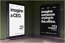 Posters saying imagine a CEO is it a man and imagine someone crying in the office is it a woman