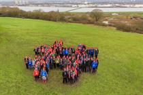 Scouts celebrated the news with a human hashtag formation