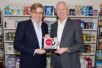 Keith Weed (left) receives the Global Marketer of the Year award from WFA's David Wheldon