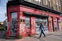 Graffiti covered closed down pub The Fox in Haggerston, East London, in May 2022. Image: Mike Kemp/Getty