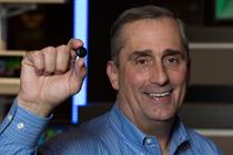 Intel CEO Brian Krzanich holds a wearable-tech prototype. 