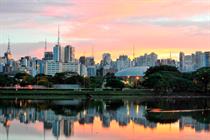  Getty: Skyline with reflections on lake at sunrise, Ibirapuera Park, São Paulo, Brazil.