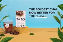 Cup of Tazo hot tea next to Tazo tea box