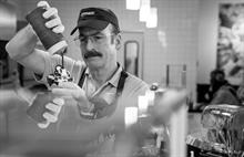 Black and white photo of Jimmy McGill working at Cinnabon