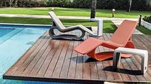 Designer garden furniture by a pool by Tramontina