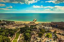 How will newly merged council's Future Parks grant help develop a 21st century green-space strategy?