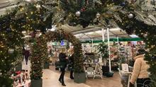 Decorated arches for Christmas in garden centre 