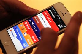 Apple iOS6 Passbook: lets iPhone users store retailer coupons and cards.