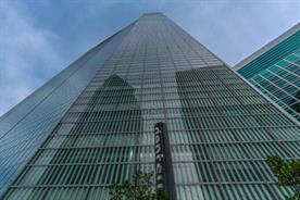 Dentsu reports decline in organic growth, cuts forecast
