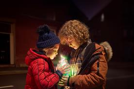 Christmas spirit: Ad follows Tilly as she spreads Christmas cheer throughout her local village