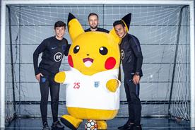 Pikachu with England footballers Michael Keane, Callum Wilson and Joe Gomez.