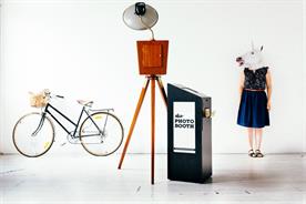 The Photo Booth Guys offers backdrops and props such as animal masks and sunglasses