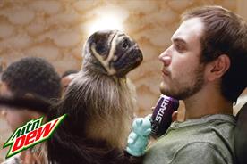 A puppy, monkey, baby come together in one odd hybrid for Mountain Dew's Super Bowl return