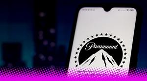 A photograph of a smartphone showing the Paramount logo