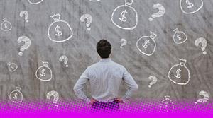 Stock photo of man looking at money and question marks 