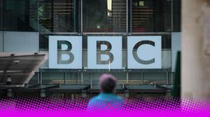 A photograph of the BBC logo on the front of a building